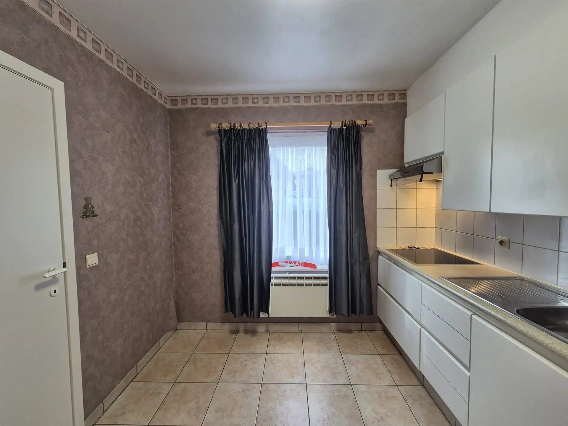 Ruim appartement met garage gelegen op het eerste verdiep vlakbij de Warande. foto 10