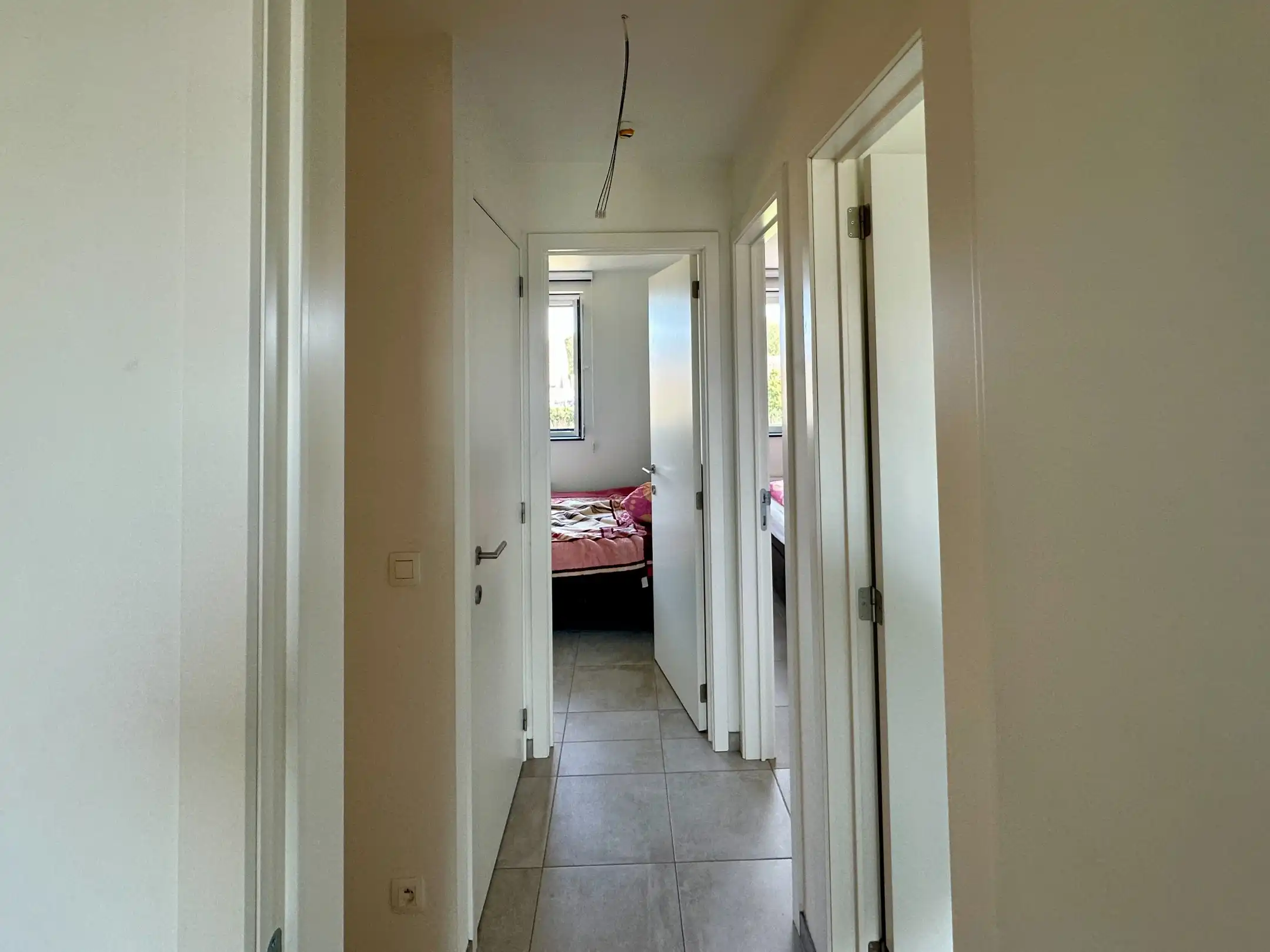Nieuwbouwrijwoning met tuin, carport en drie slaapkamers in Maasmechelen foto 14
