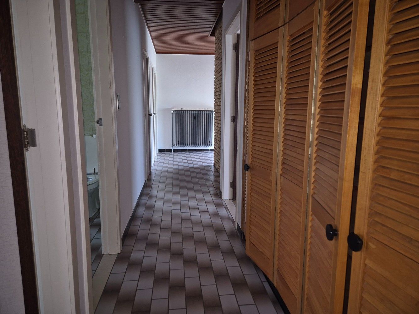 Ruime gelijkvloerse woning met 3 slaapkamers, gezellige tuin en uitstekende ligging foto 15