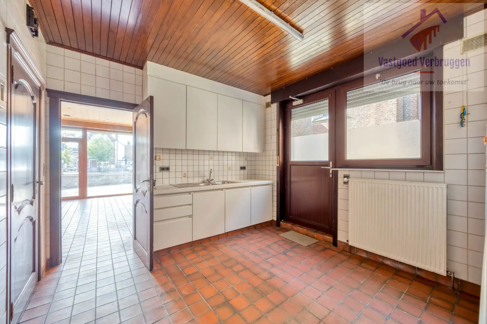 Ruime woning vergund als kamerwoning (3 kamers) met winkelruimte foto 6