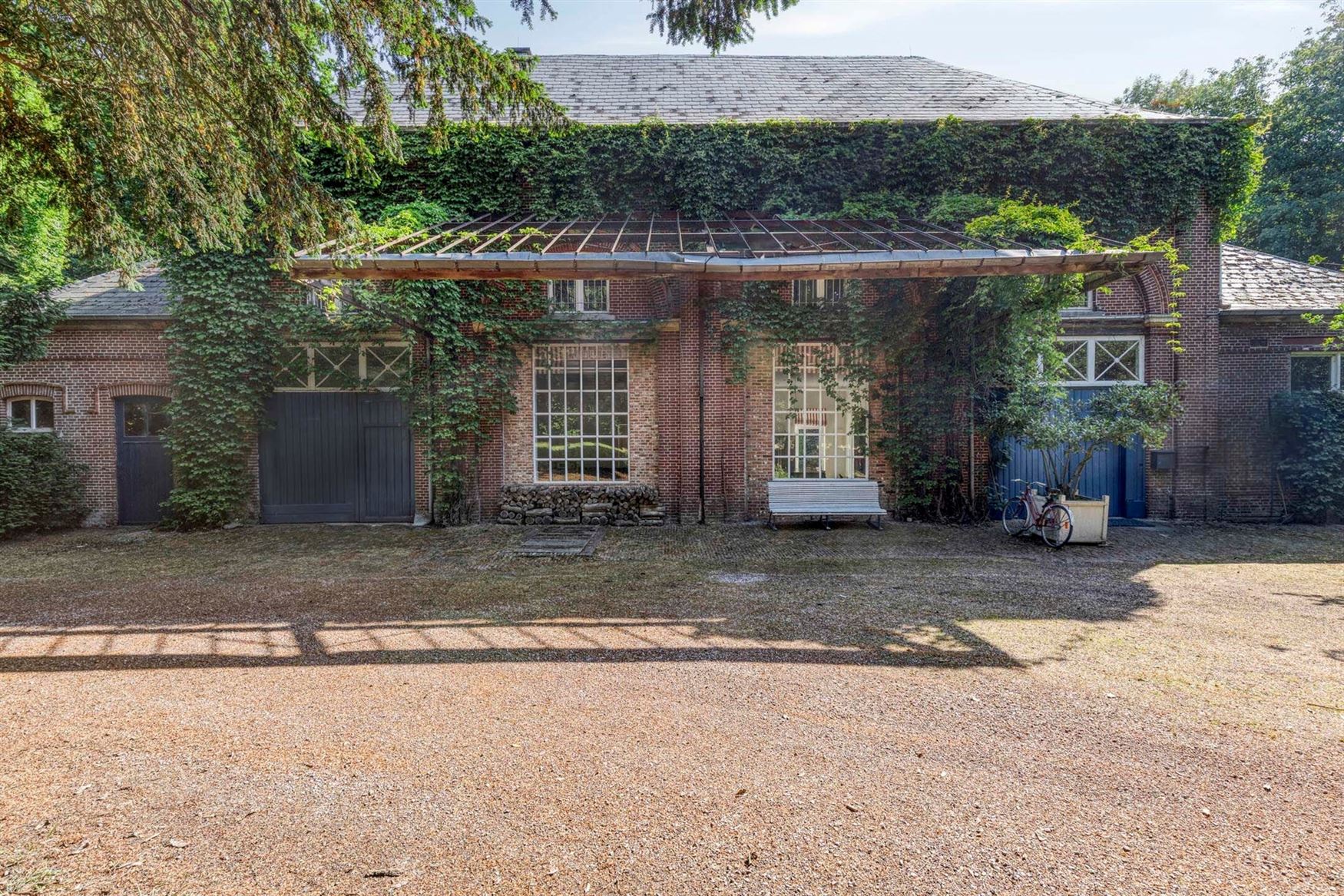 Uitzonderlijk koetshuis op kasteeldomein in Hansbeke, 487m² puur woongenot foto 5