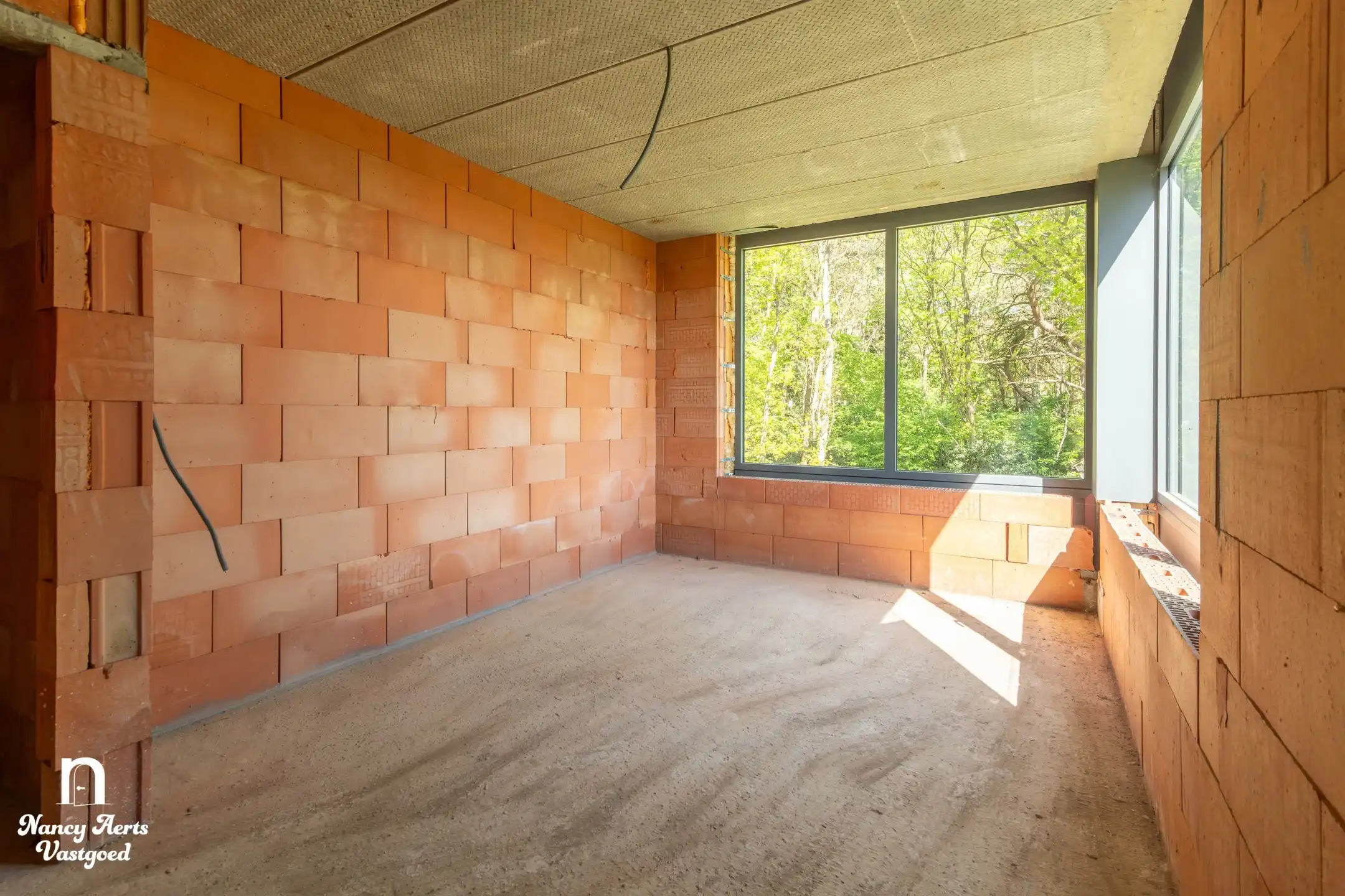 Moderne gezinswoning met tuin en afwerking naar eigen smaak foto 10