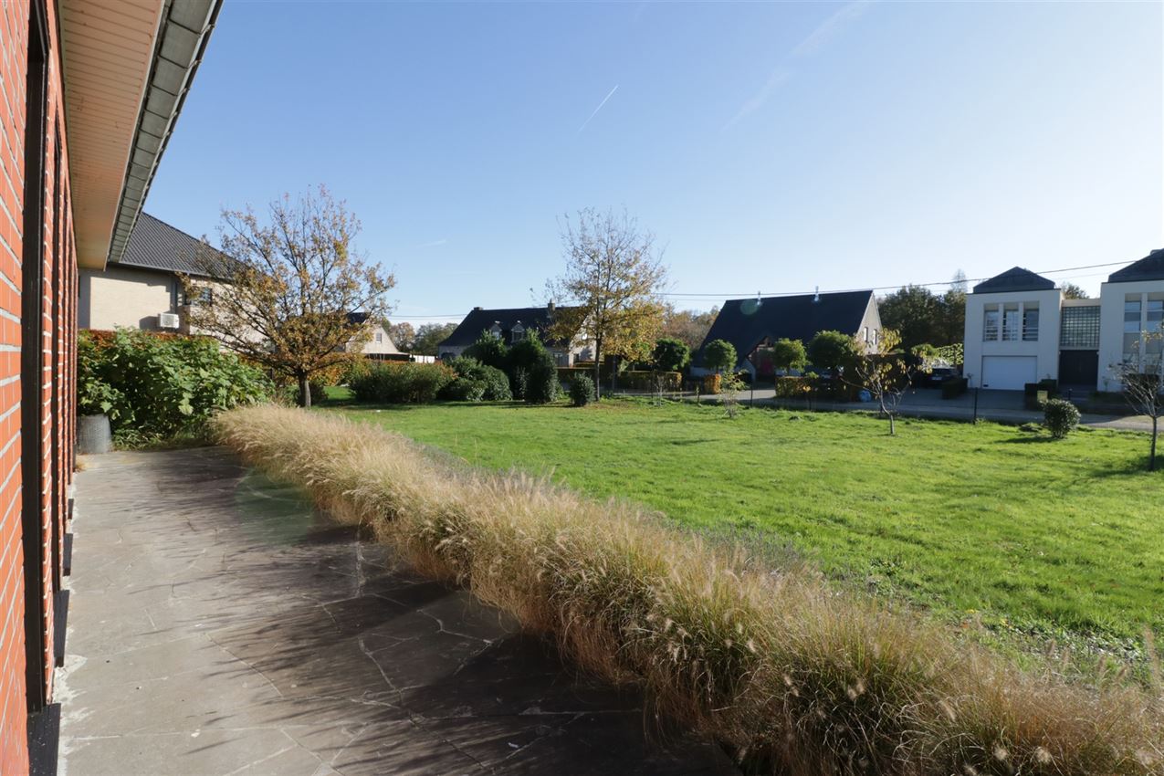 Rustig gelegen woning met 2 slpk, riante tuin en garage foto 32