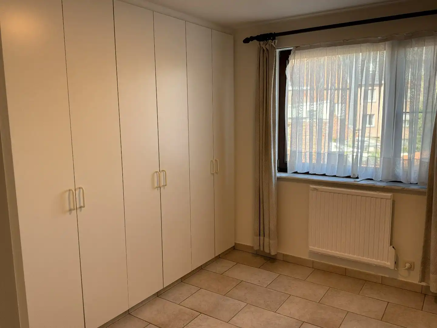 Ruim en lichtrijk appartement met 2 slaapkamers te huur in centrum Izegem foto 7