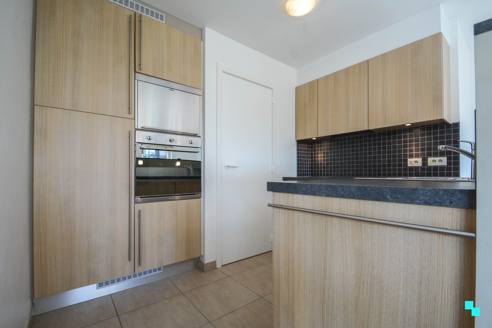 Ruim tweeslaapkamer appartement nabij centrum Izegem foto 13