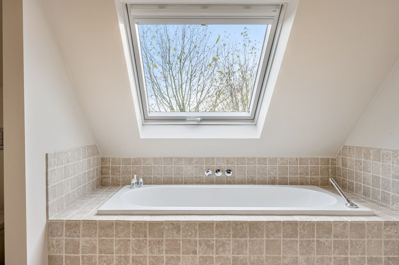 Instapklare halfopen bebouwing met 4 slaapkamers in Oostakker foto 23