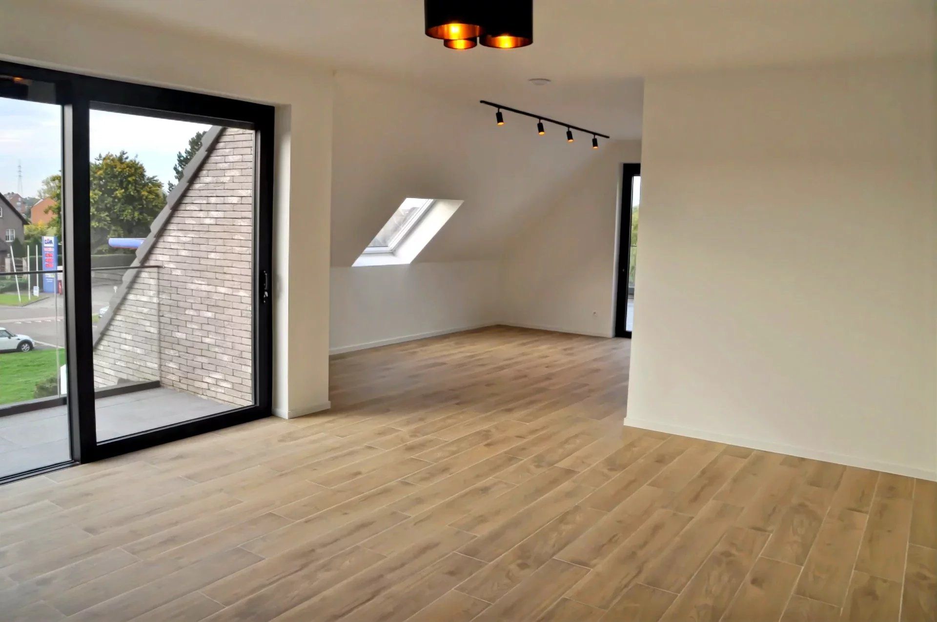 EXCLUSIEF EN KWALITATIEF NIEUWBOUWAPPARTEMENT VAN 163 M² MET 3 SLPK'S, 2 BADK'S EN RIANTE TERRASSEN IN MUNSTERBILZEN foto 2