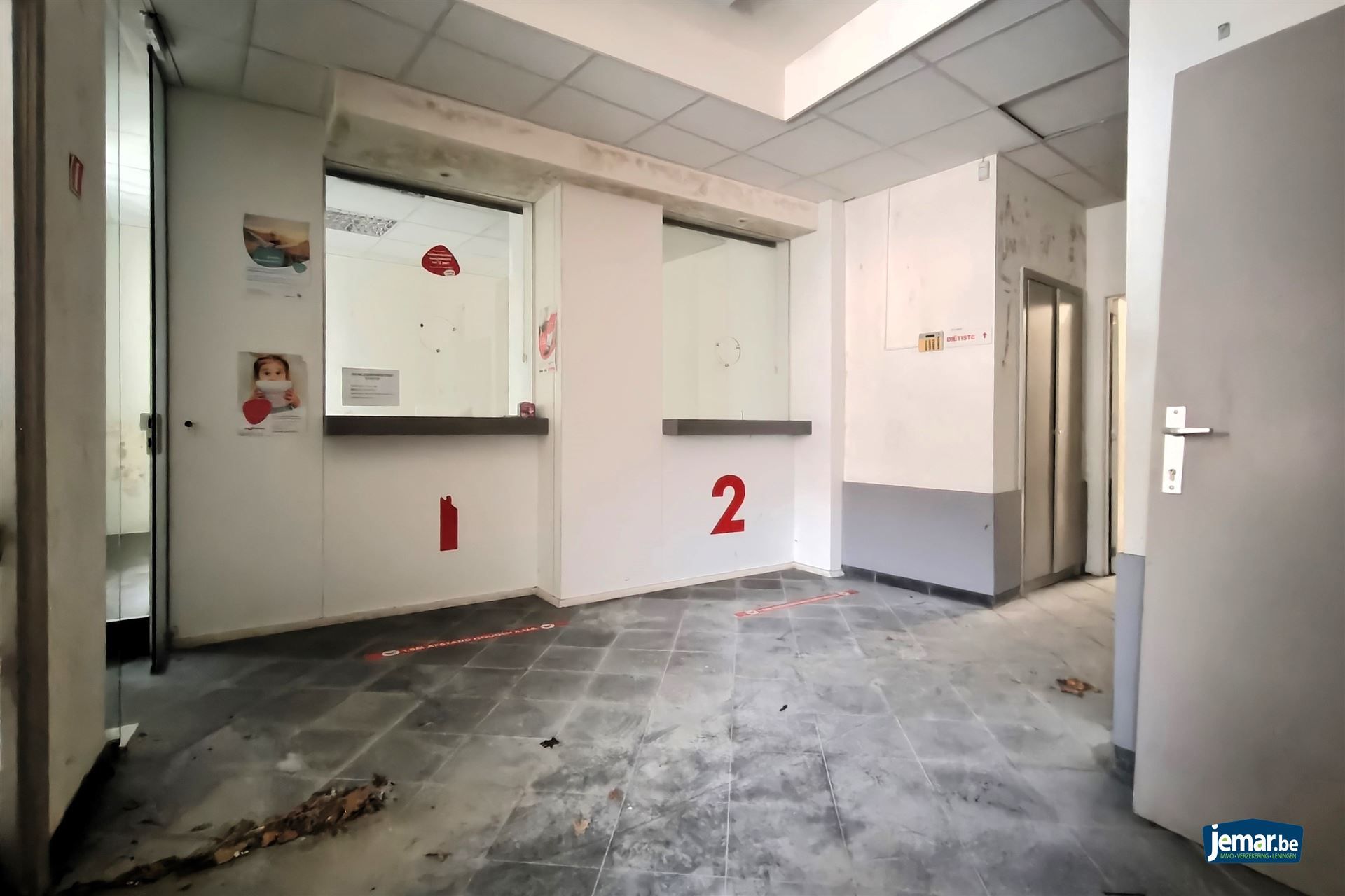 Te renoveren kantoorgebouw (311m²) in het historisch centrum van Borgloon foto 3