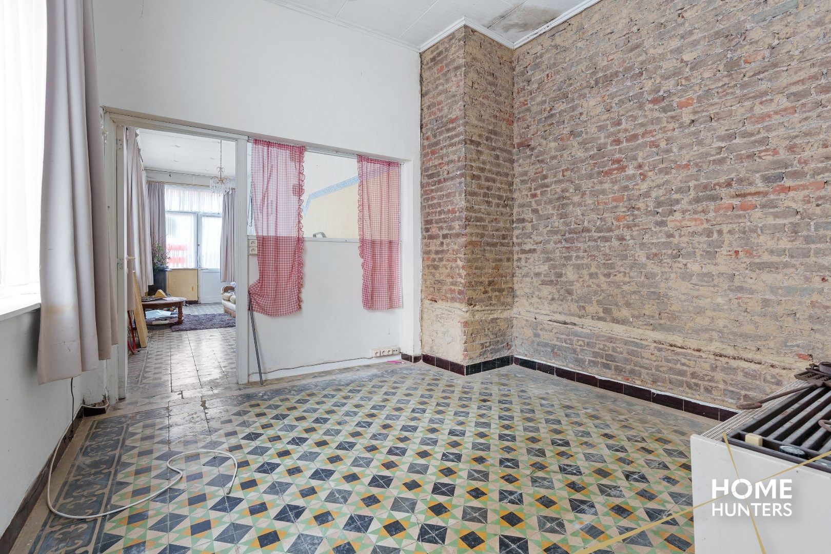 Te renoveren woning in het historische stadscentrum van Ieper foto 5