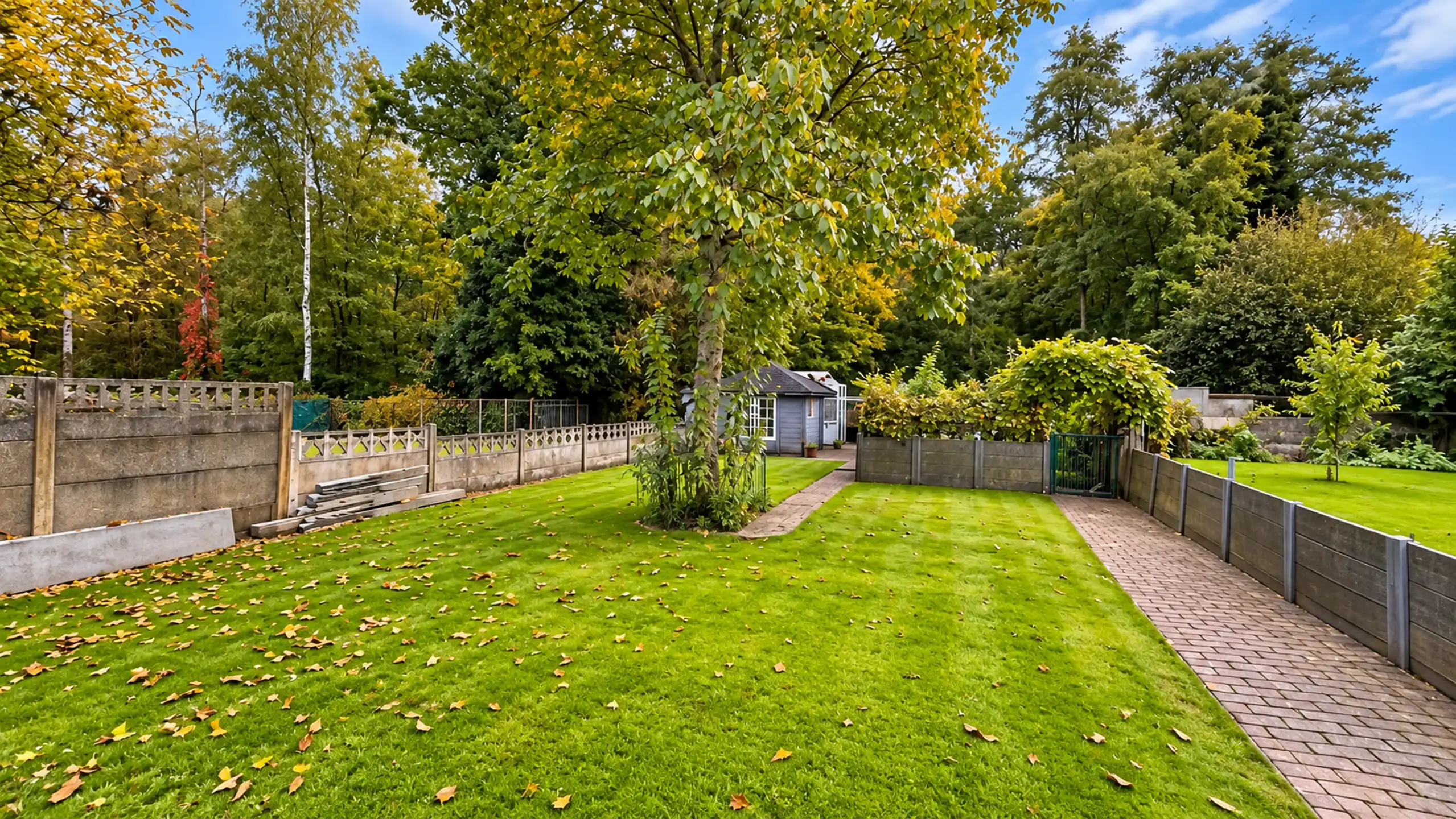 Instapklare halfopen bebouwing met zonnige tuin en garagebox foto 42