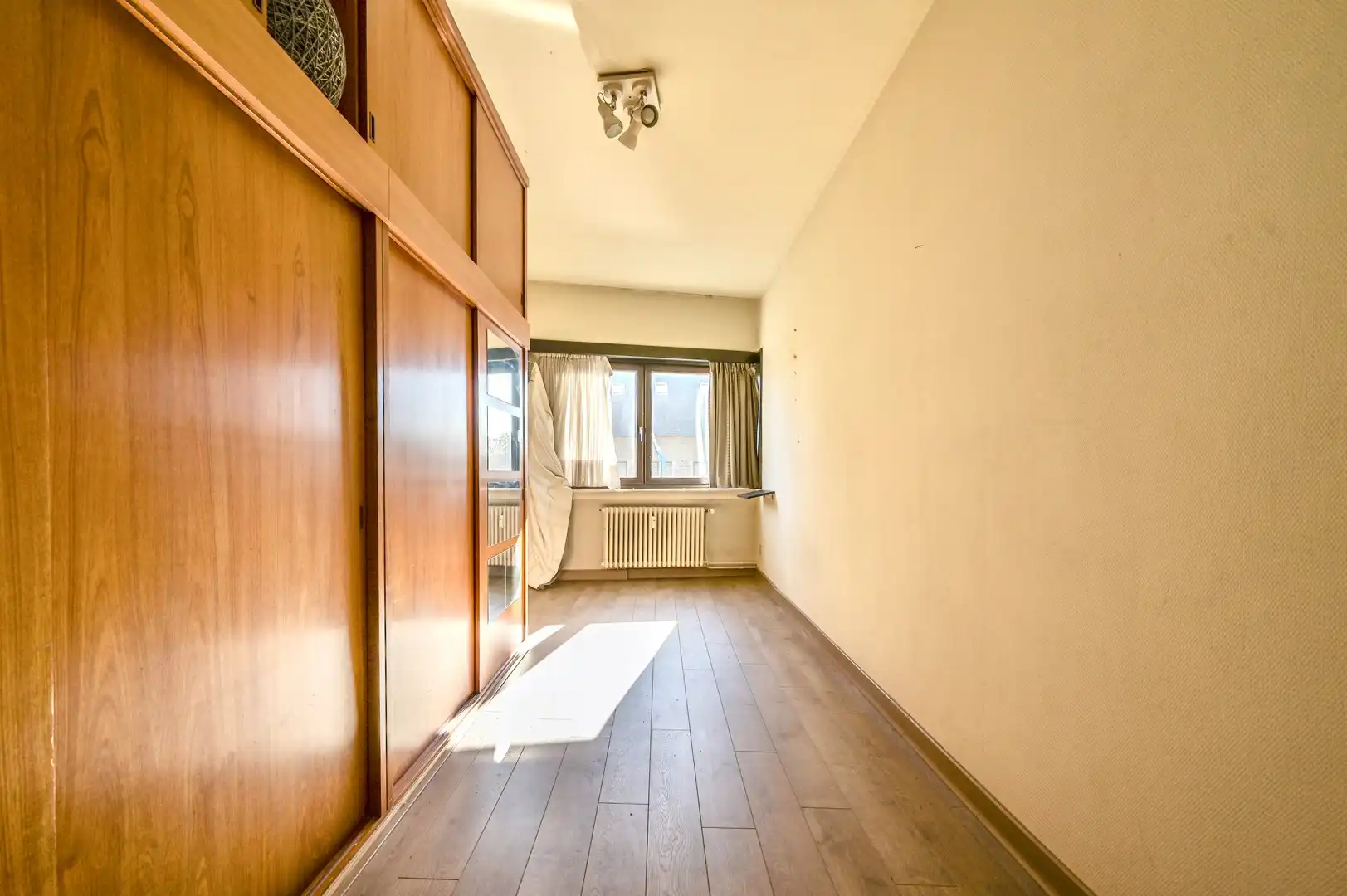 Handelspand met ruim appartement te huur in het hart van Bornem foto 10