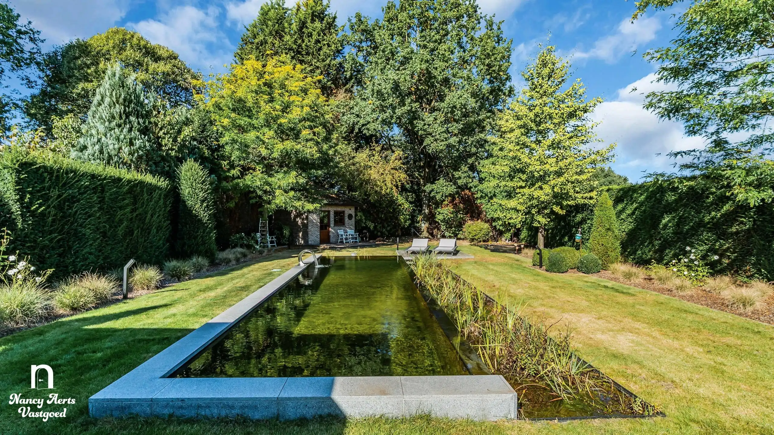 Karaktervolle villa met natuurzwembad en poolhouse in Genk foto 21