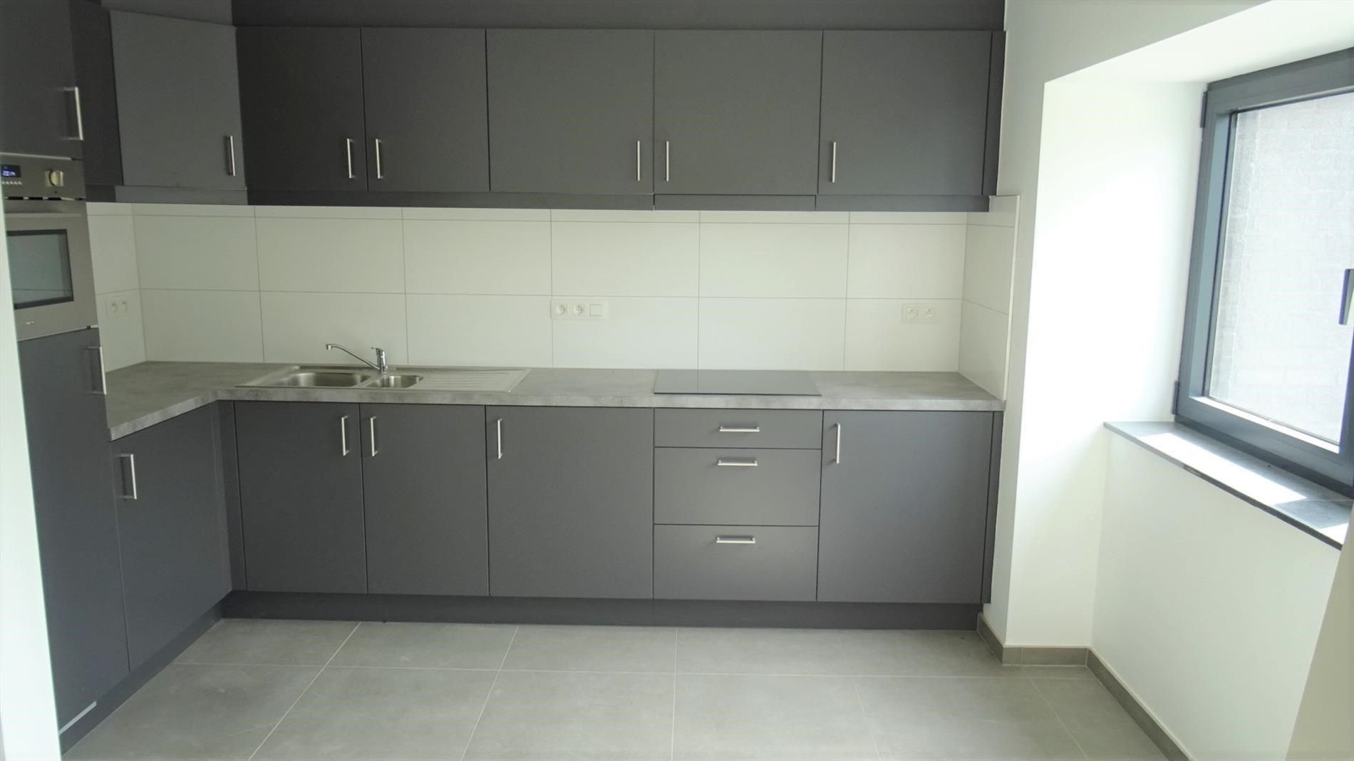 Goed gelegen duplex met 2 slpks, terras en autostaanplaats foto 4