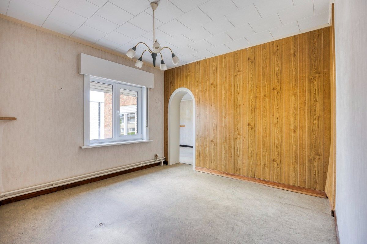 Ruim ingedeelde woning met 3slpks op een gunstige ligging. foto 17