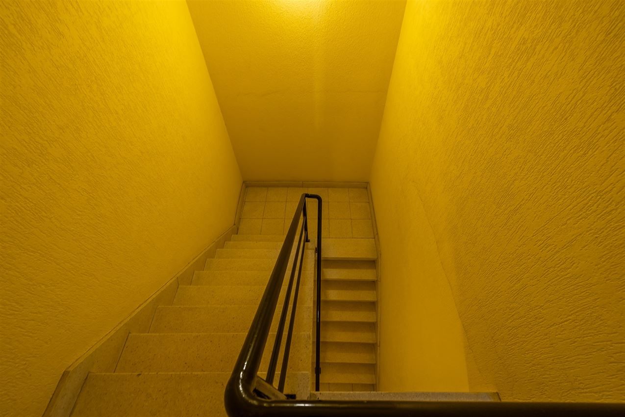 Verzorgd gebouw met handelszaak en 2 apt foto 39