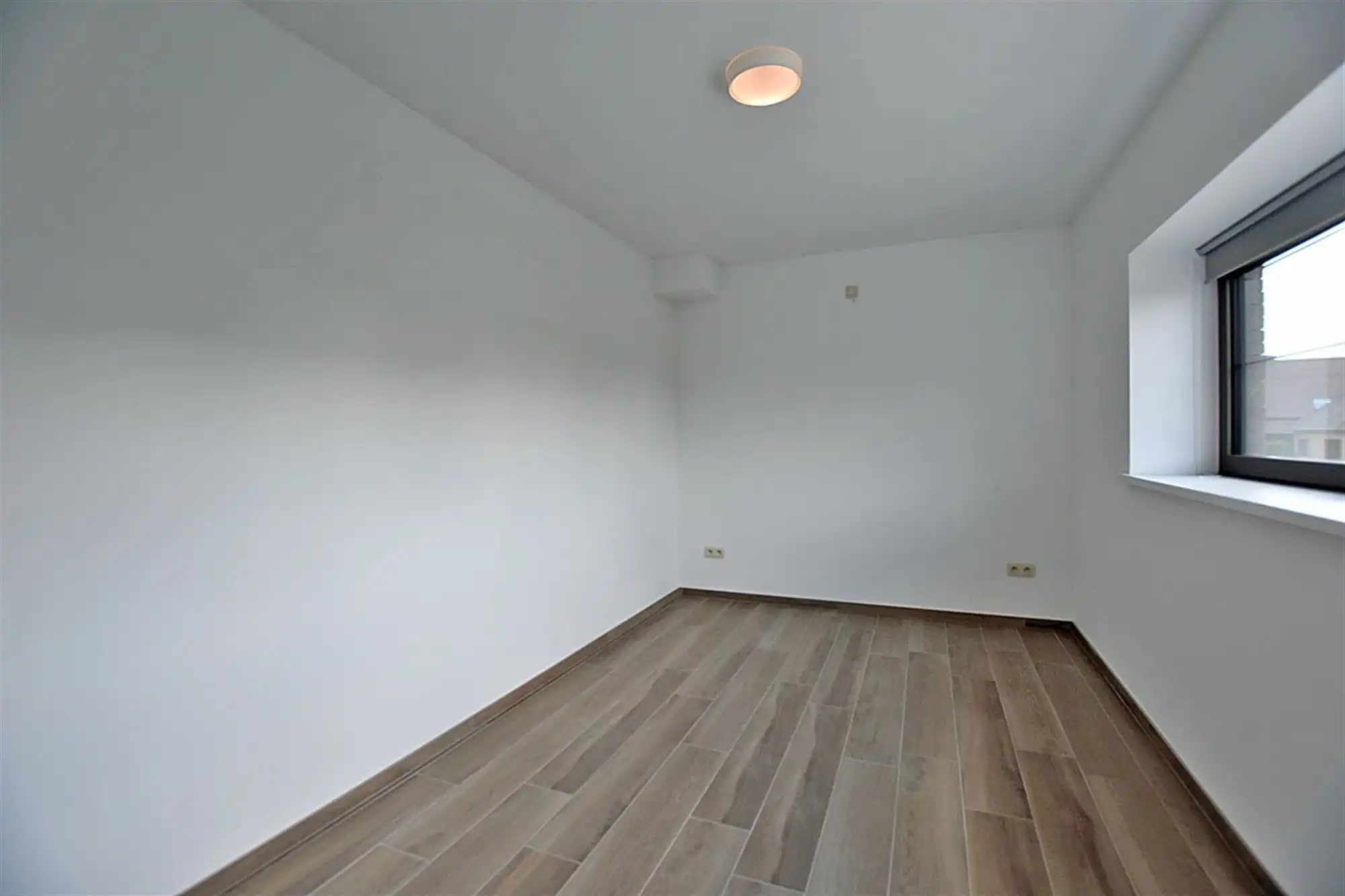 Recent, instapkl. APPARTEMENT met 2 slpks, terras & ruime garage foto 8
