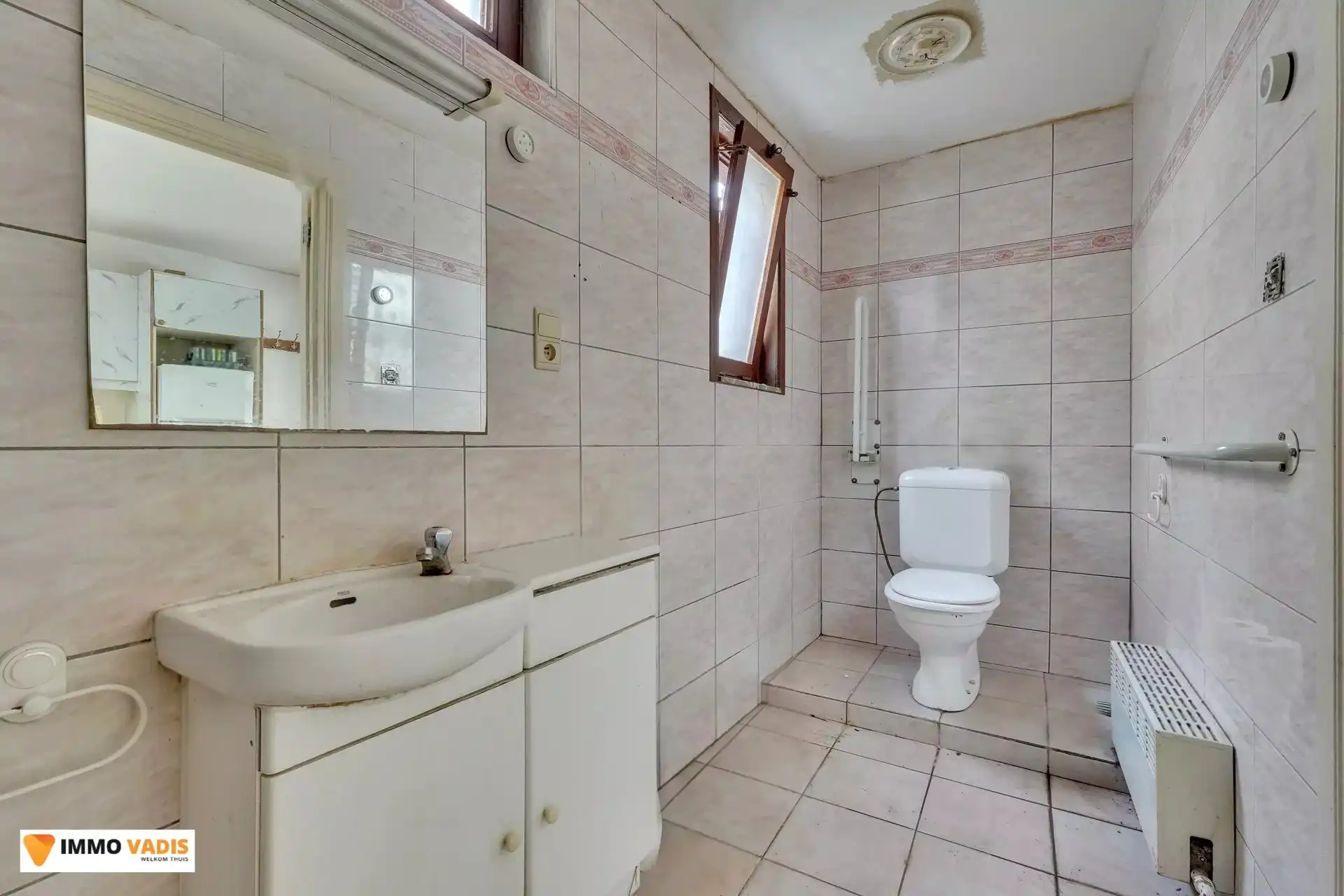 Authentiek herenhuis met karakter, klaar voor een stijlvolle renovatie. foto 6