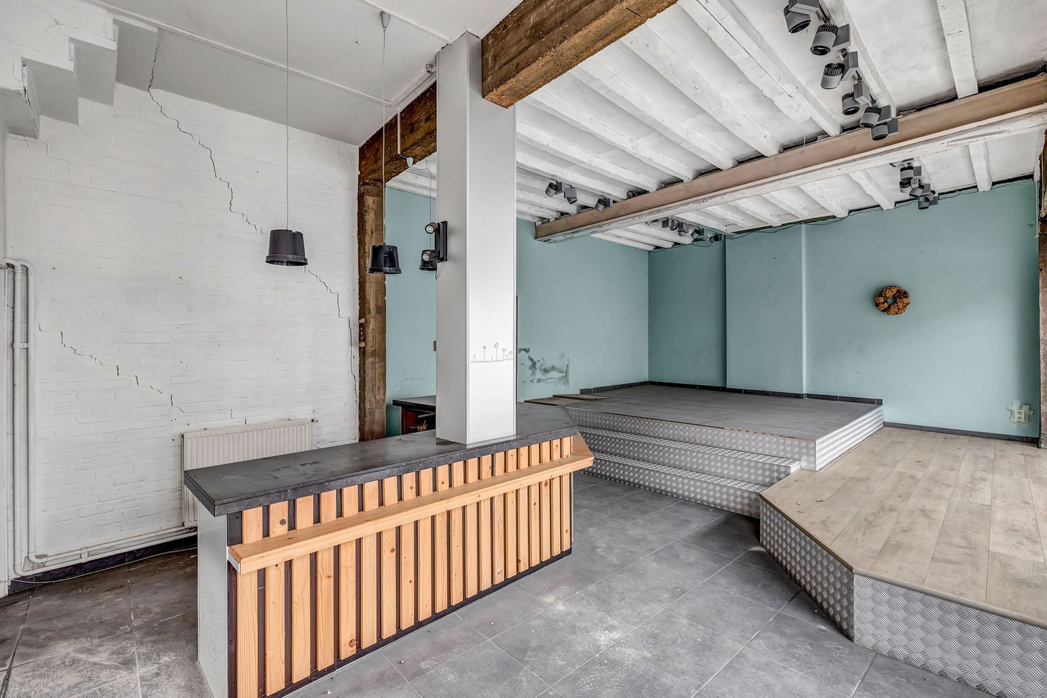 Opbrengsteigendom: Handelsruimte met 3 slpk app in centrum foto 8