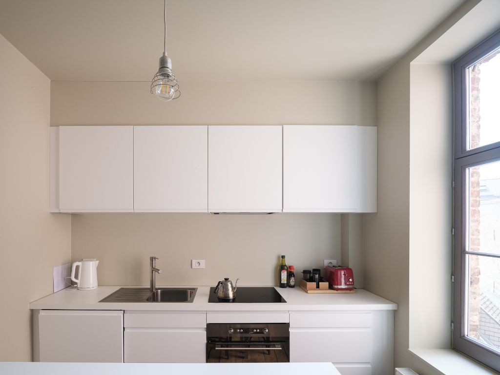 Karaktervol handelspand (restaurant + 2-slpk app) in het centrum van Gent foto 18