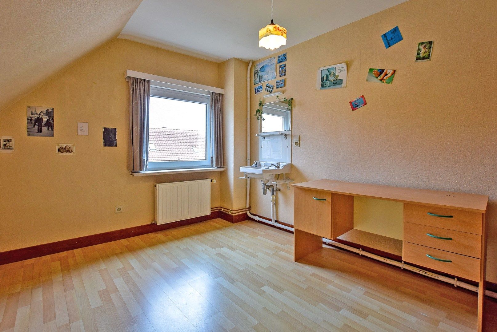 Goed gelegen te renoveren rijwoning bestaande uit een voorgebouw en achterbouw, pal in het centrum van De Panne.  foto 15