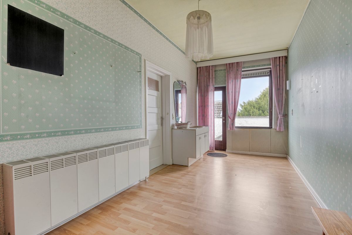 Karaktervolle stadswoning met handelsruimte, tuin en ruime garage in hartje Tongeren foto 15