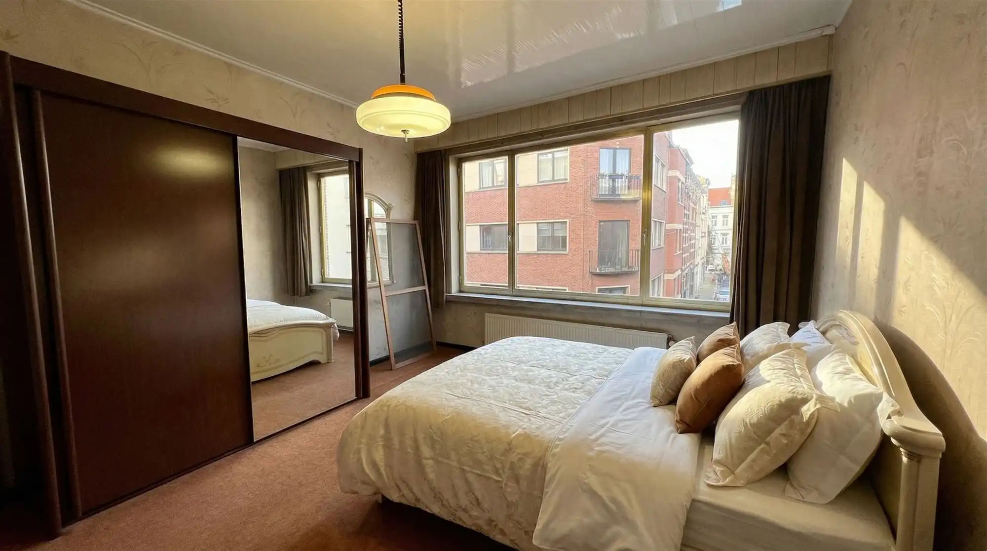 Bel-etagewoning met garage aan Sint-Andriesplaats. foto 12