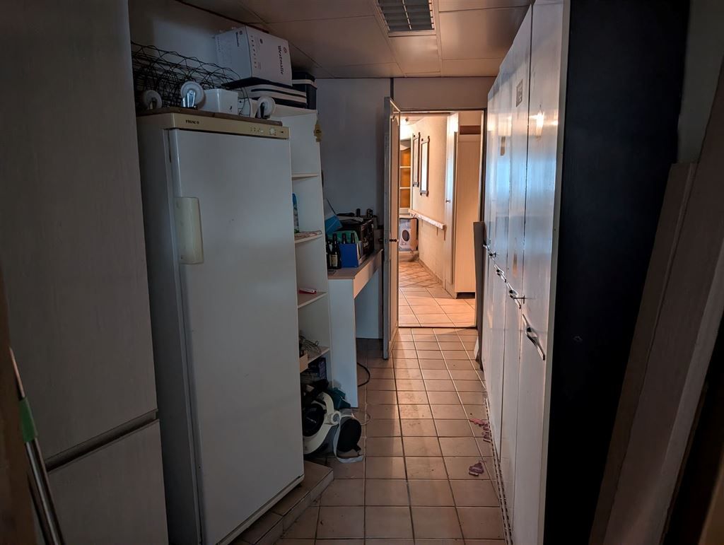 Gebouw met 2 appartementen en magazijn foto 31