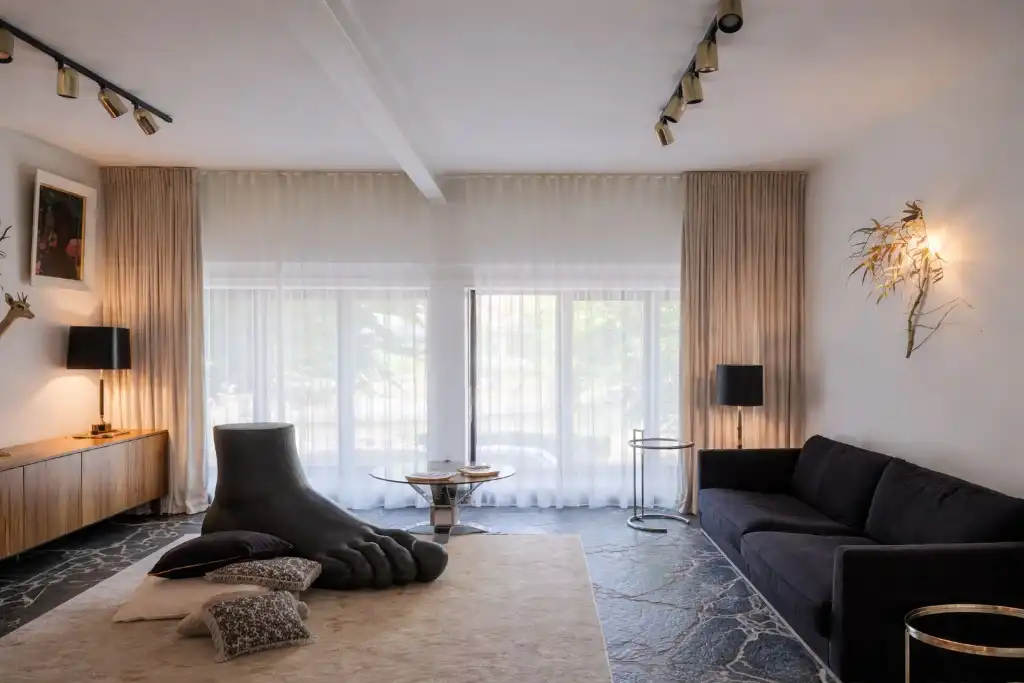 Imposant designappartement met loftallures nabij het Wintercircus en De Krook foto 3