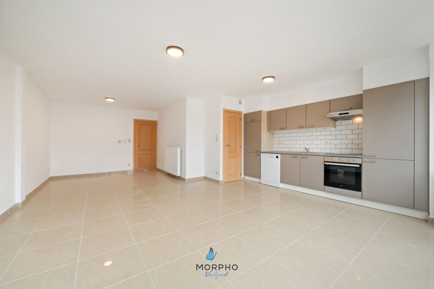 Modern en energiezuinig 2-slaapkamerappartement op de derde verdieping in hartje Temse! foto 2