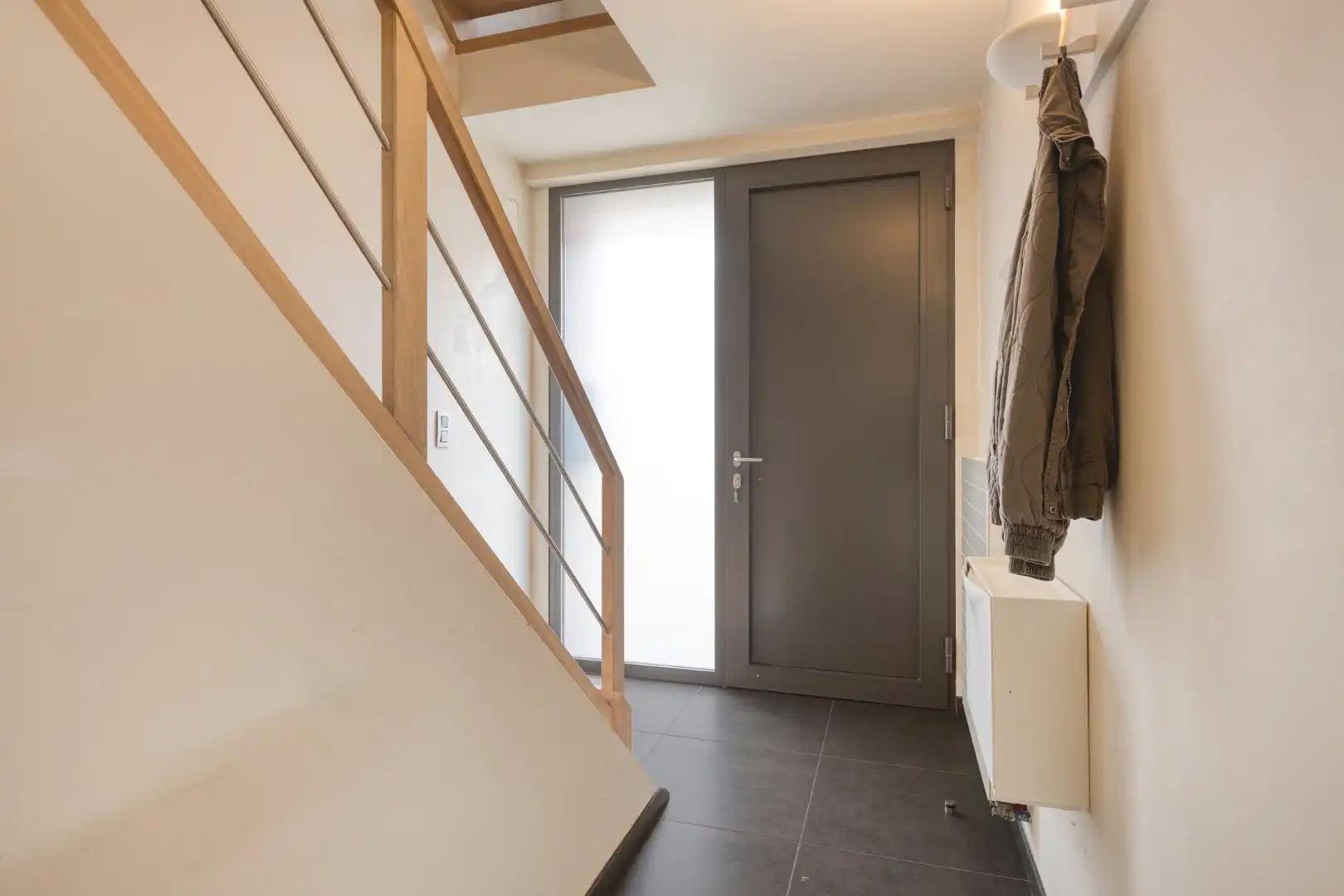 Instapklare bel-etagewoning met dubbele garage en tuin in het centrum van Retie foto 34