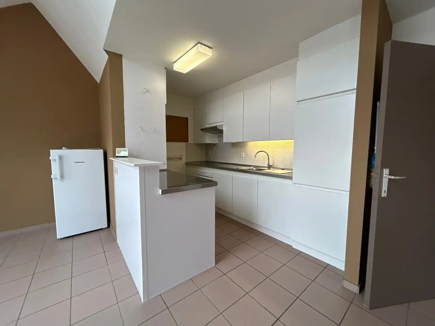 Ruim en lichtrijk dakappartement in Wespelaar centrum foto 4