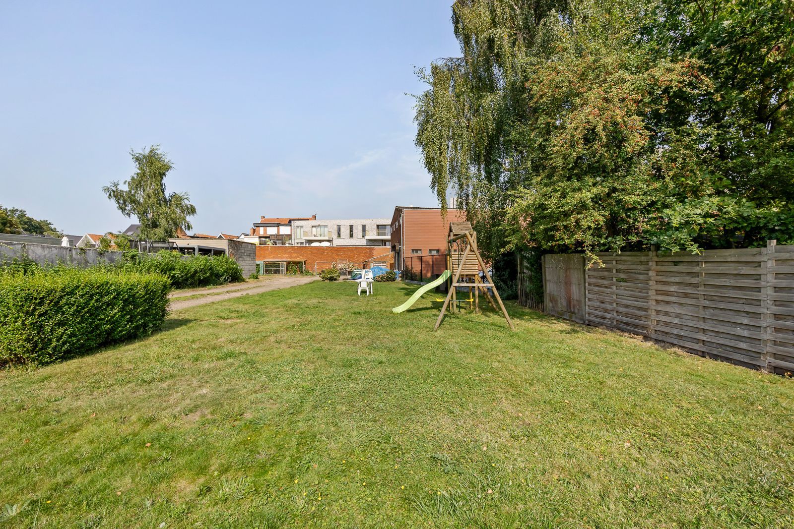Trendy en ruim appartement met autostaanplaats en tuin in hartje Kapellen! foto 18