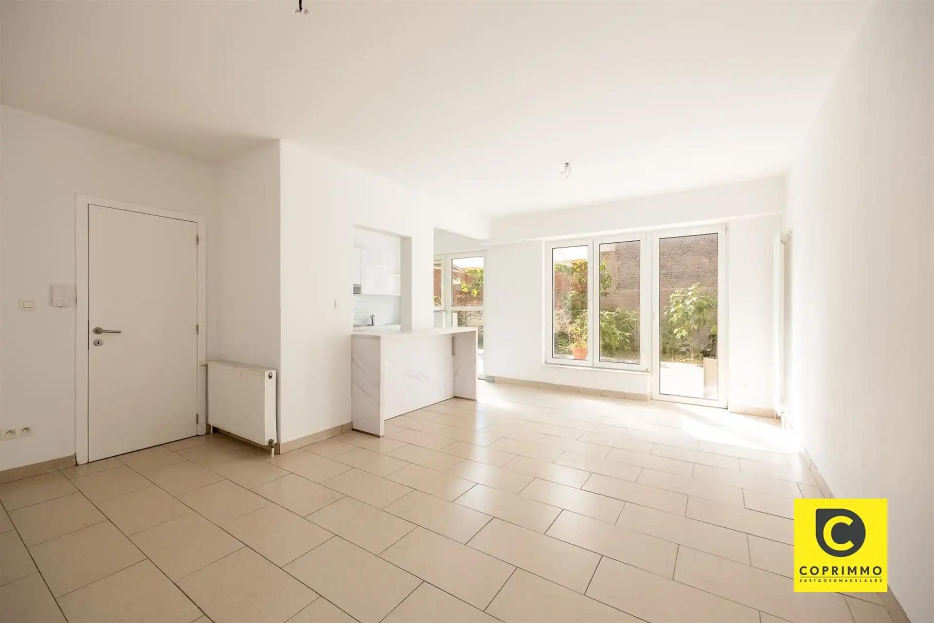 Instapklaar 3slpk appartement met tuin en garagebox ! foto {{pictureIndex}}