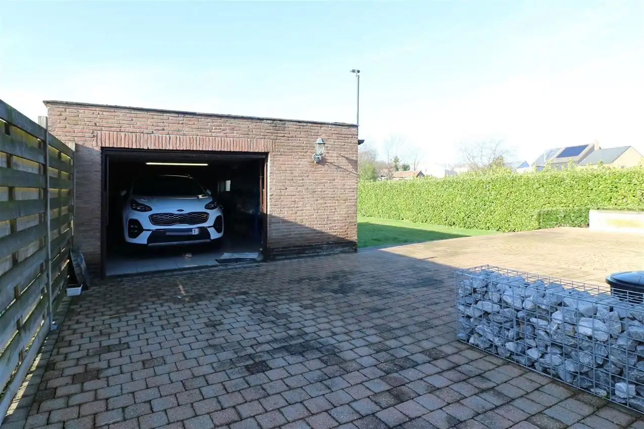 Rustig gelegen gelijkvloerse woning met drie slaapkamers foto 24