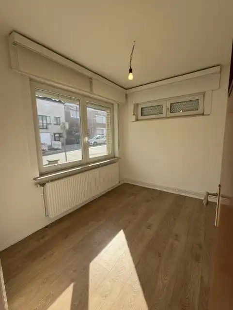 Gelijkvloersappartement met 2 slaapkamers + kelder foto 8