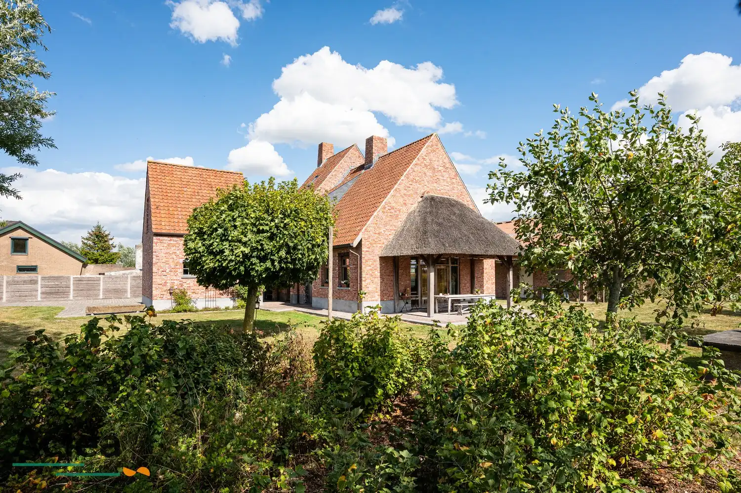 Karaktervol landhuis met paardenstal op 5.943m² in een groene omgeving foto 35