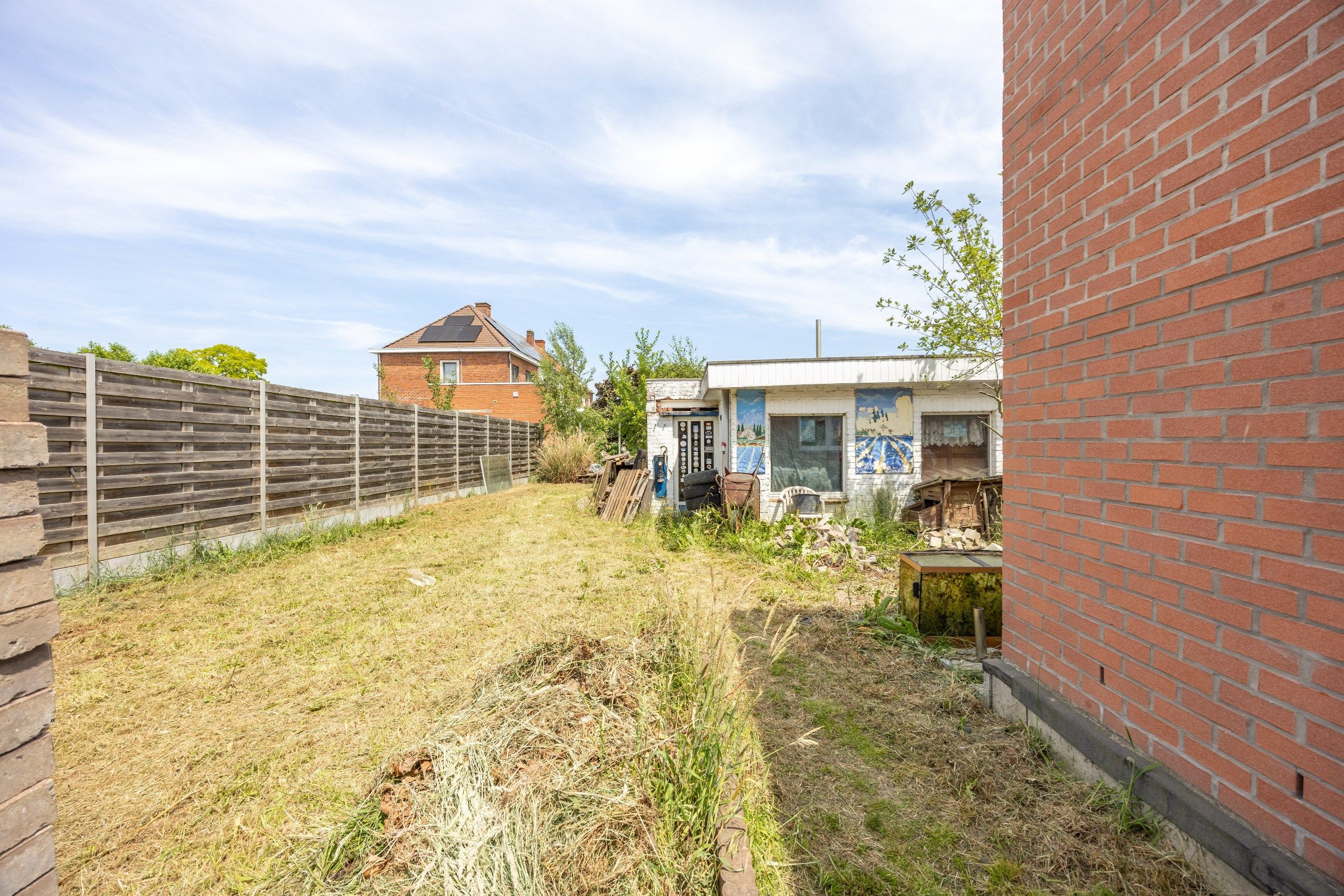 Verder te renoveren halfopen woning met uitweg.  foto 19