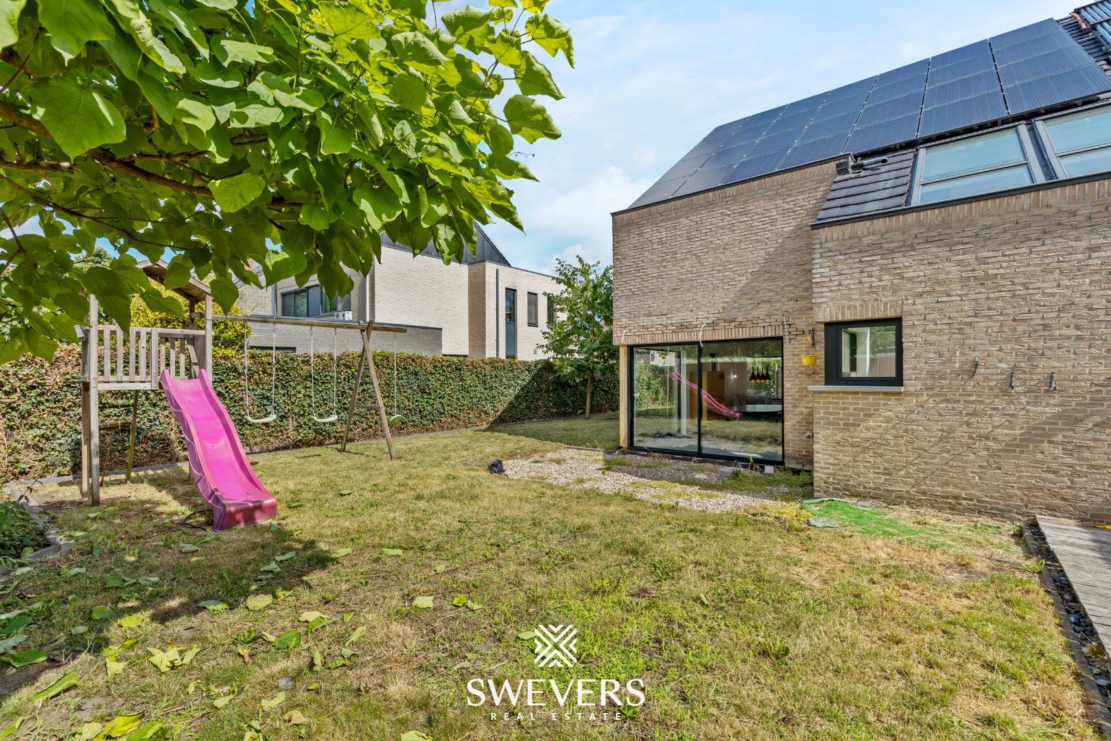 Volledig vernieuwde gezinswoning met stijlvolle vide en zuidgerichte tuin in Hasselt foto 28
