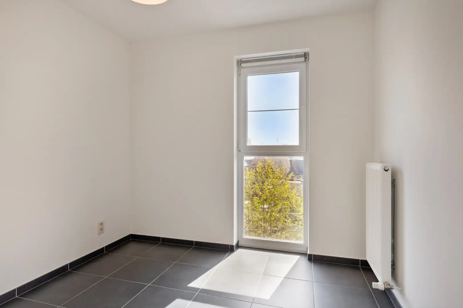 Rustig en zonnig gelegen appartement met 1 slpk en autostaanplaats in Herentals-centrum ! foto 8