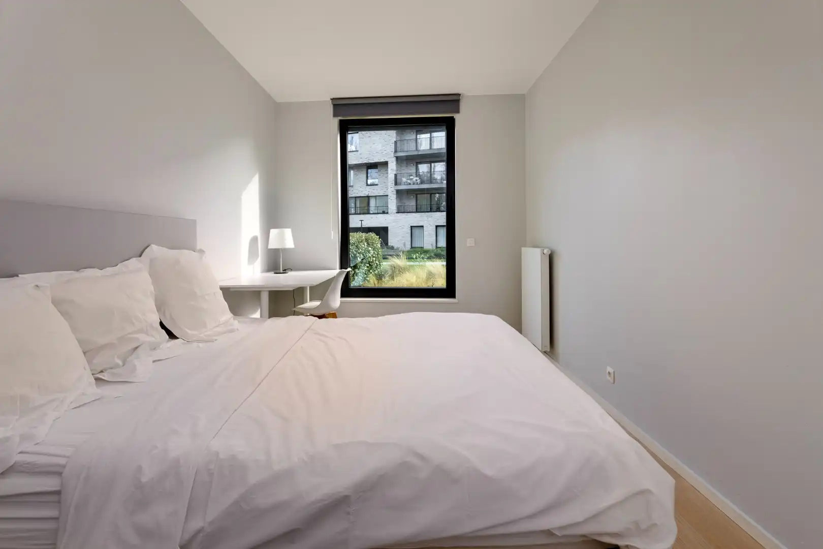 3- slaapkamer appartement gelegen te midden van het groen met privatieve tuin. foto 12