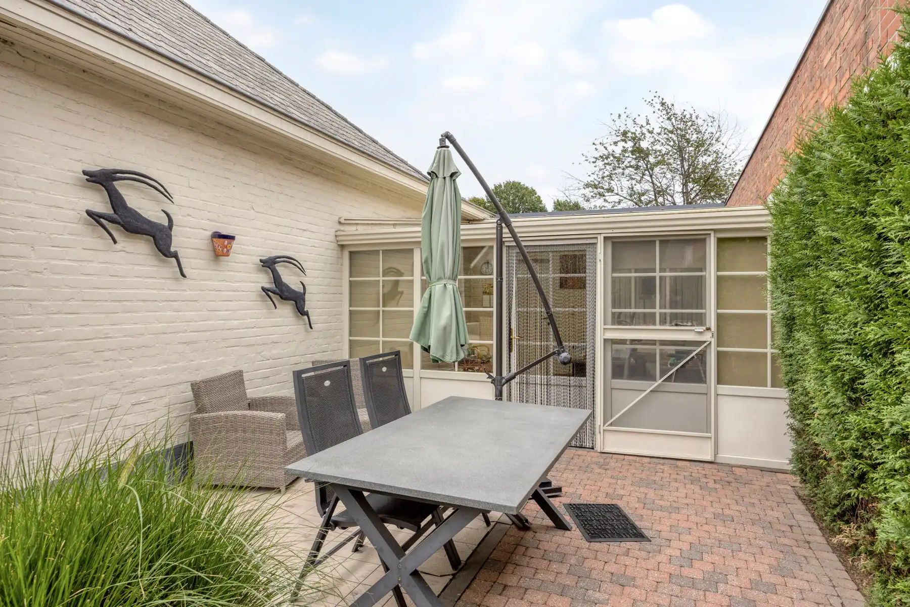 Achterliggende gelijkvloerse woning op mooi perceel foto 20