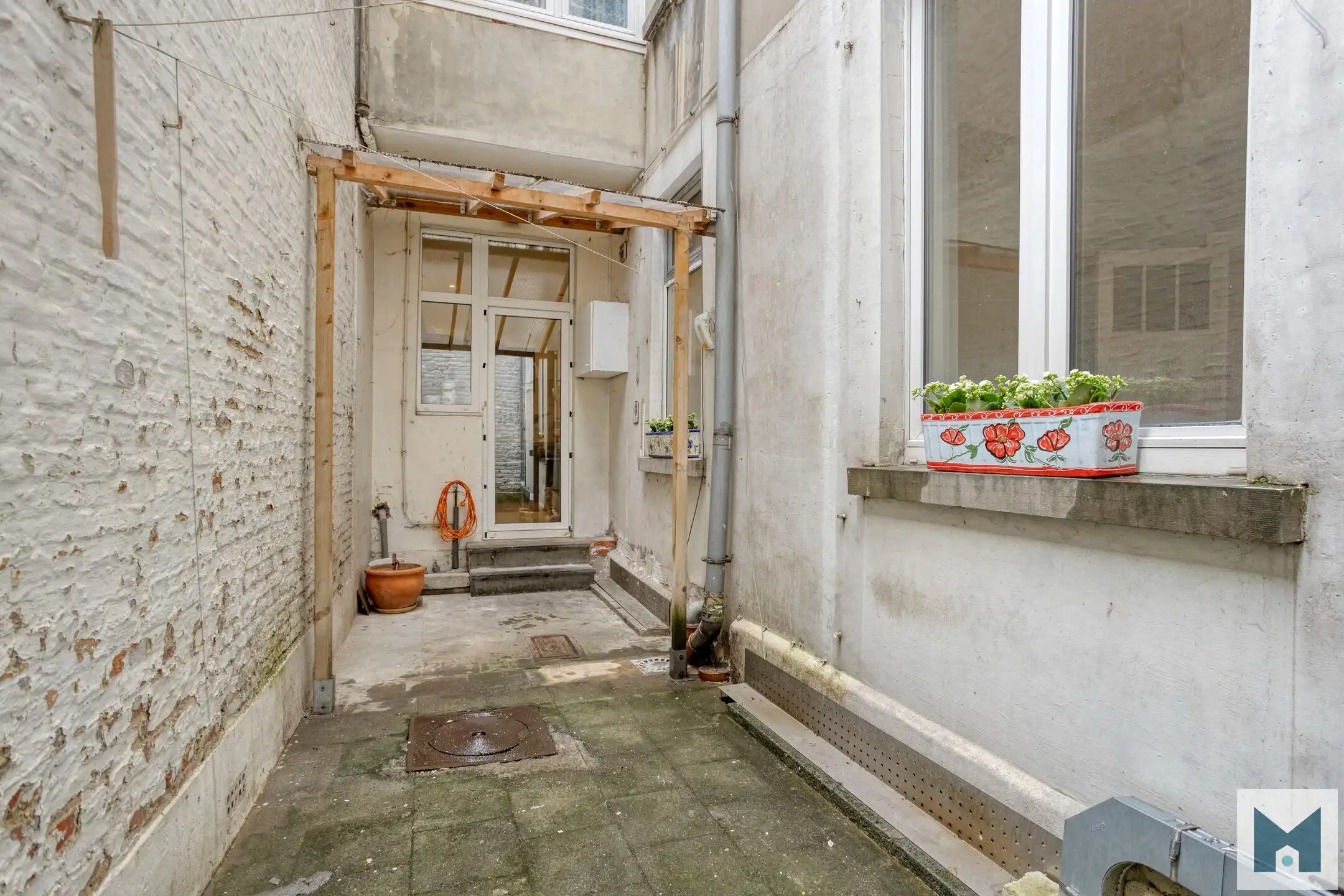 Ruim gelijkvloers appartement met 2 slpks en stadskoer! foto 18