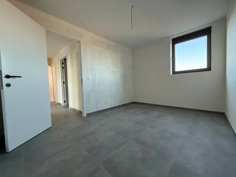 Prachtig BEN-penthouse met 1 slpk, terras, parking én zonnepanelen in het centrum van Houthalen foto 5