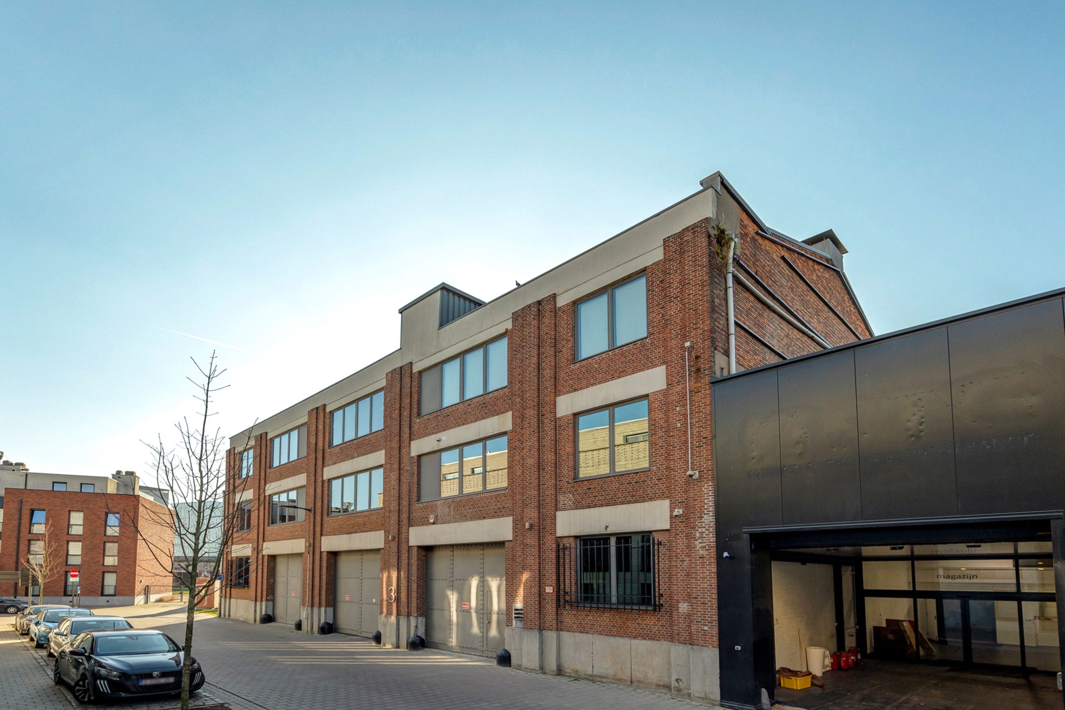 ANTWERPEN DAM - Historisch pakhuis met penthouse en garage foto {{pictureIndex}}