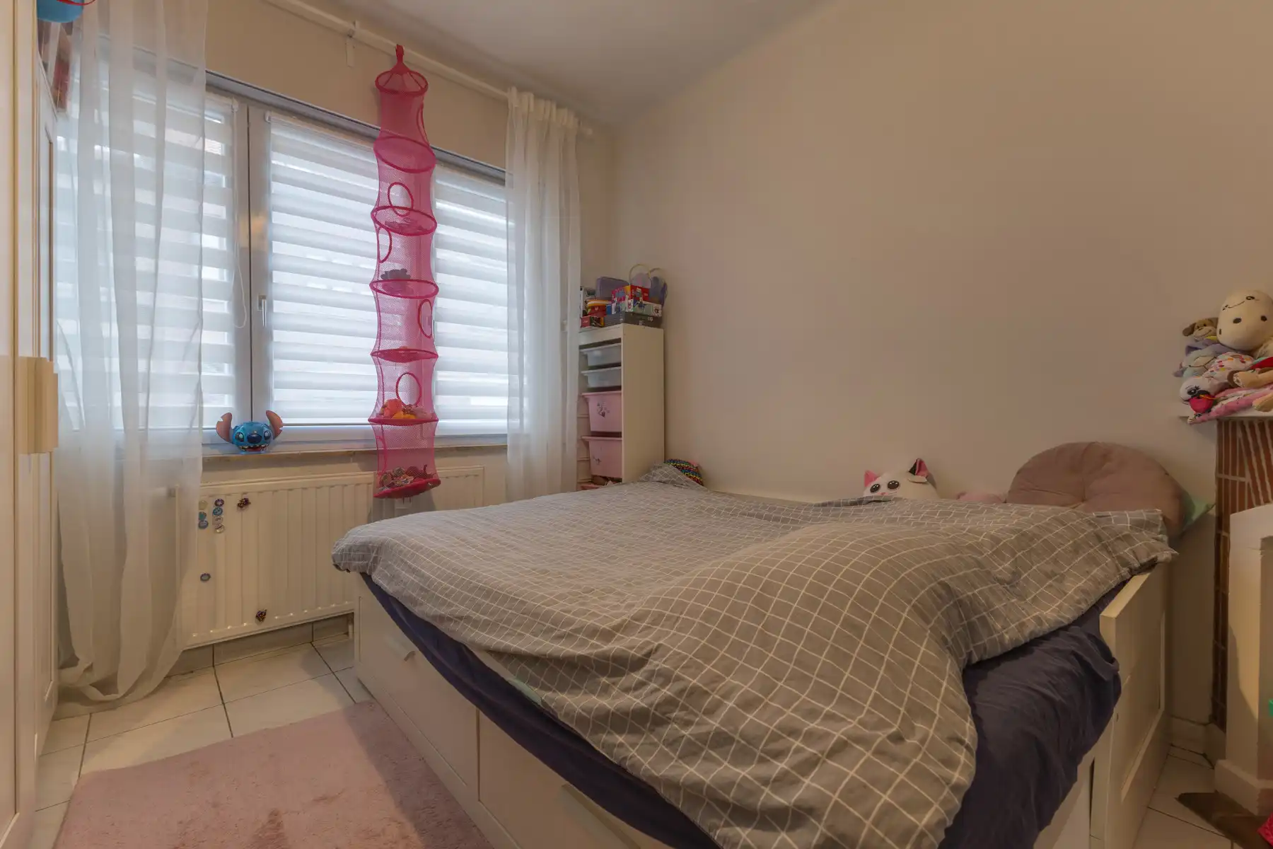 Gelijkvloers appartement met terras en tuin (+ kelder) foto 12