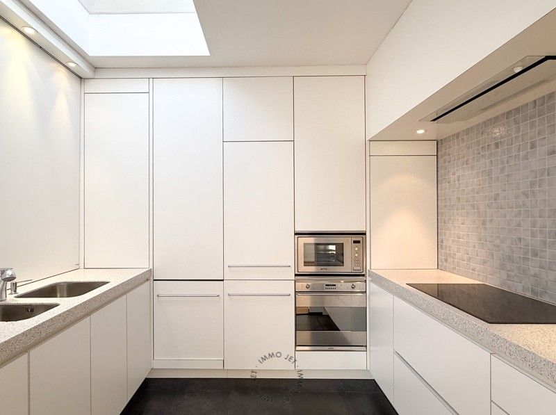 Ruime bel-etagewoning met 3 slaapkamers, tuin en garage foto 9