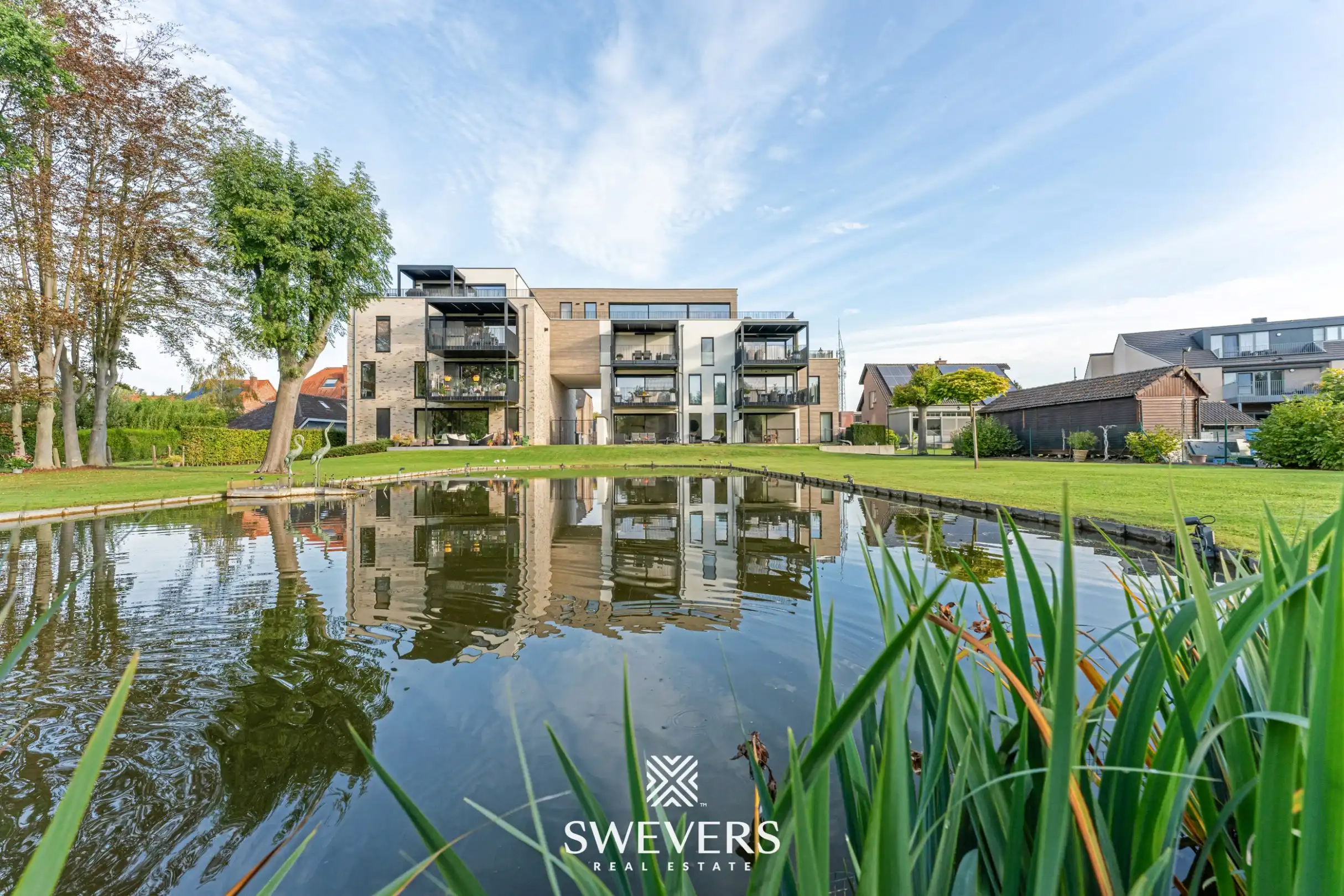 Appartement met twee autostaanplaatsen en terras met uitzicht op prachtige binnentuin foto 18
