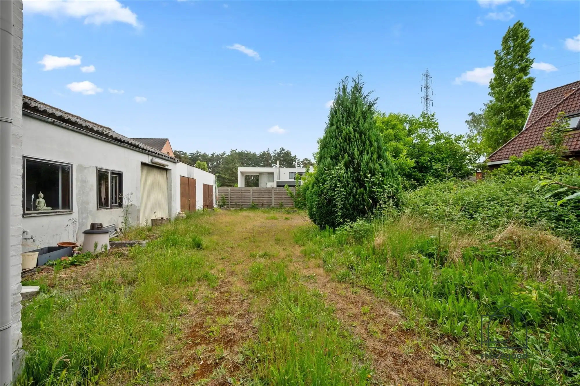 Te renoveren huis (tweewoonst)  met mogelijkheid tot 2 bouwgronden foto 35