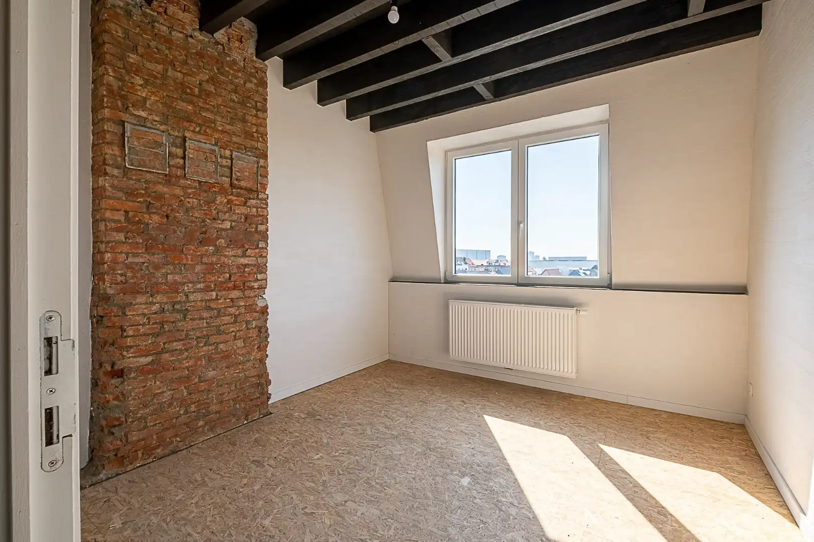 Genieten op hoogte: lichtrijk dakappartement met terras foto 9
