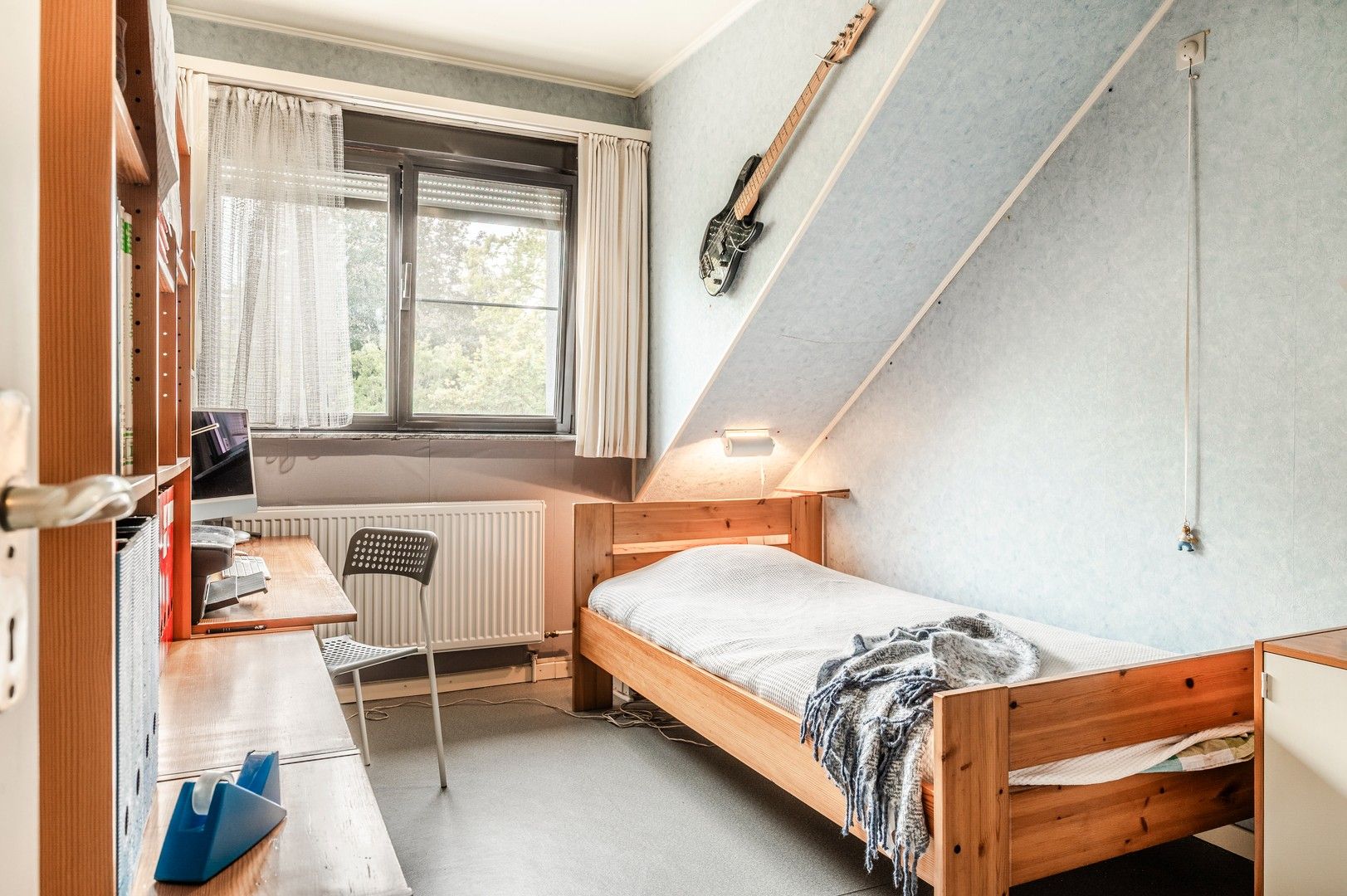 Praktische bel-etagewoning met 3 slaapkamers en tuin. foto 17